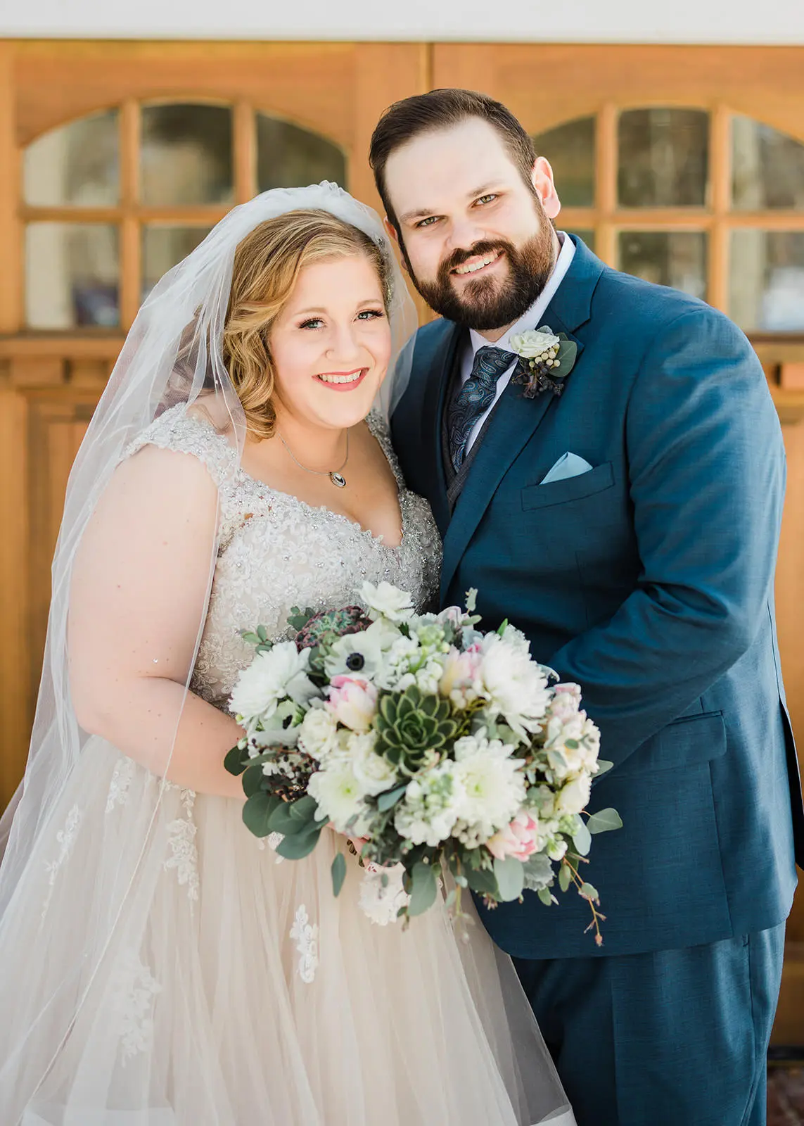 Couple portrait inside The Chapel — wooden doors and natural light at Grand View Lodge — Tim Larsen Photography, Brainerd Lakes MN