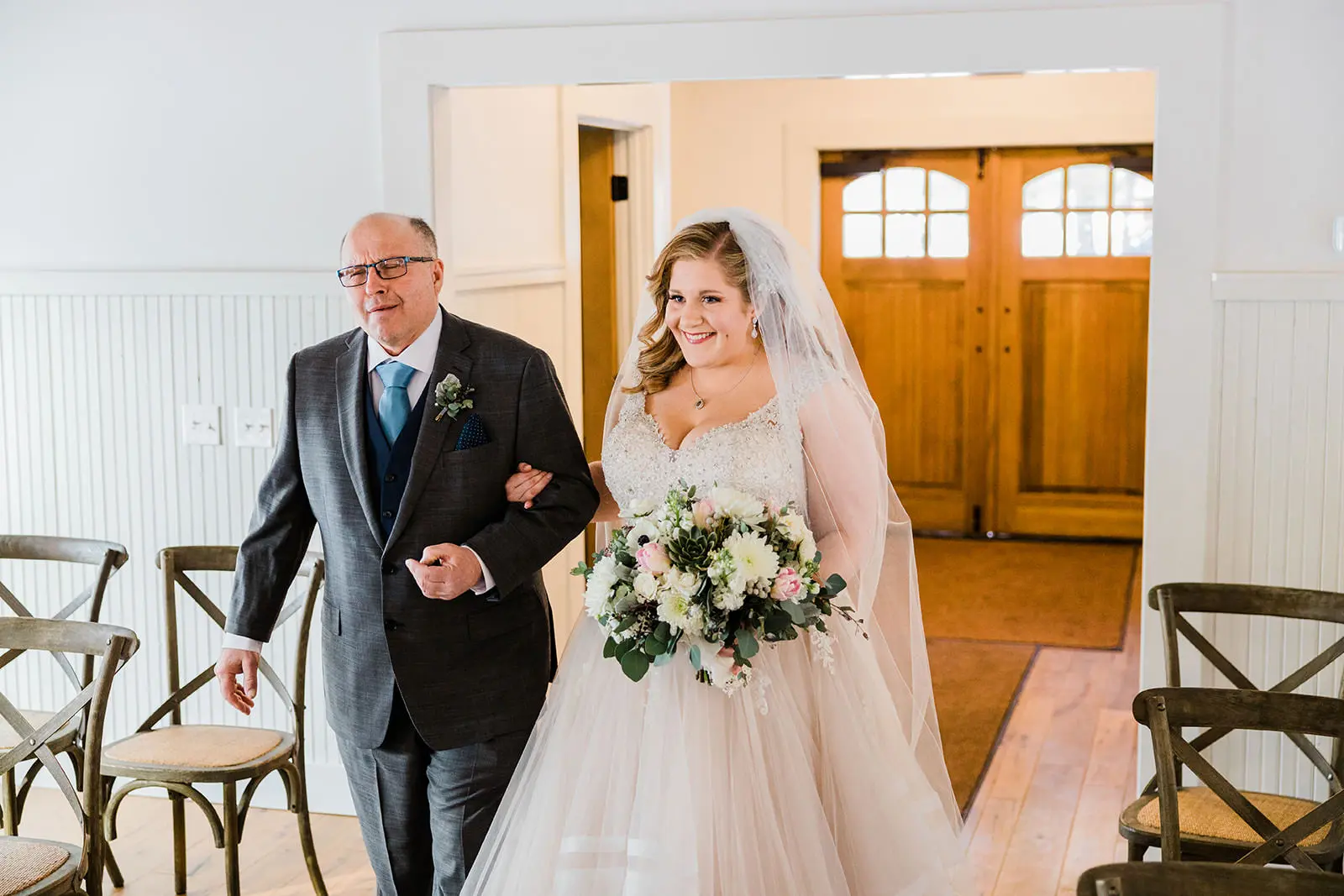 Lauren and her father walking down the aisle — The Chapel at Grand View Lodge — Tim Larsen Photography, Brainerd Lakes MN