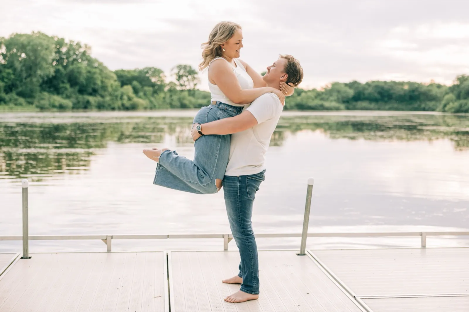 Abby and Anthony share a kiss by the water at Lake Auburn — Tim Larsen Photography