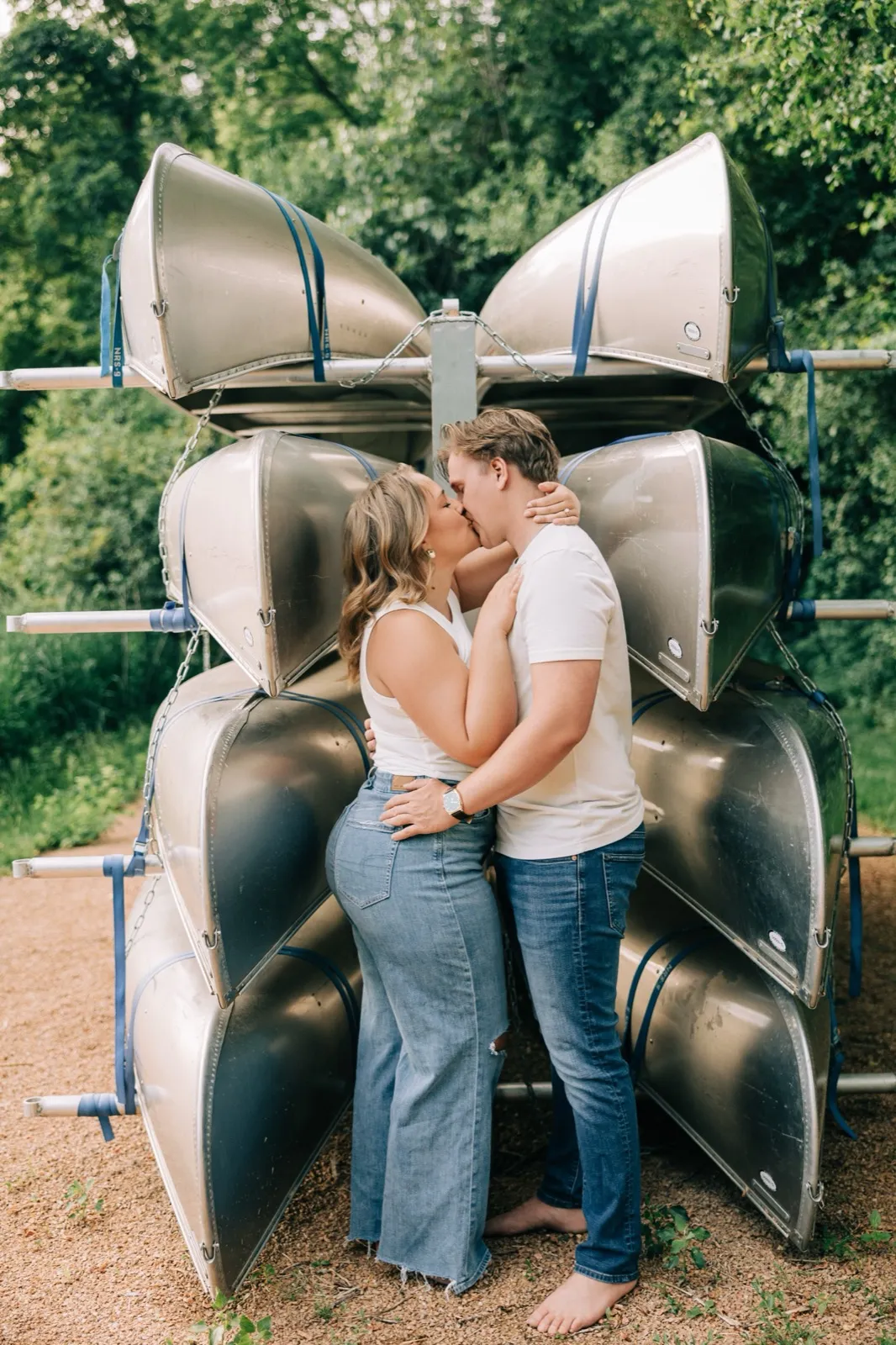 Detail of Anthony's hand at the small of Abby's back, his watch and her engagement ring in the frame — Tim Larsen Photography