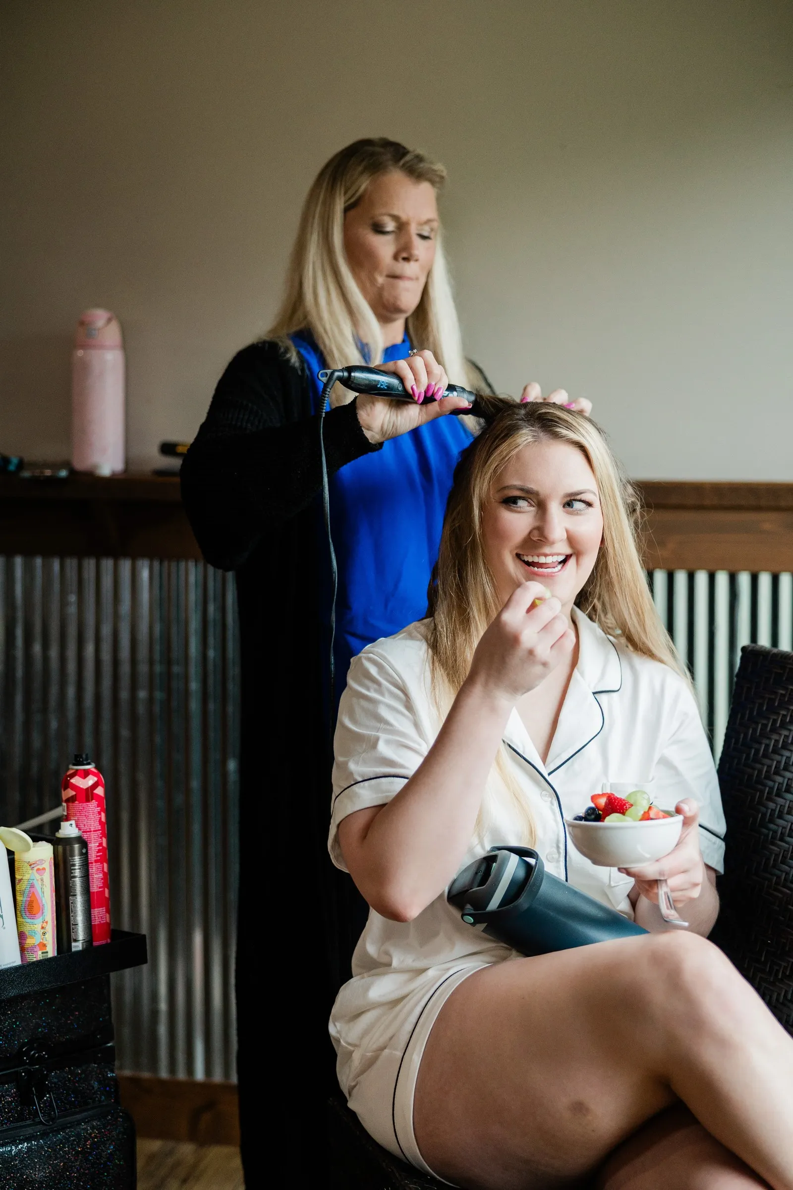 Lauren smiles while having her hair styled in the Garden Cottages — Tim Larsen Photography, Brainerd Lakes MN