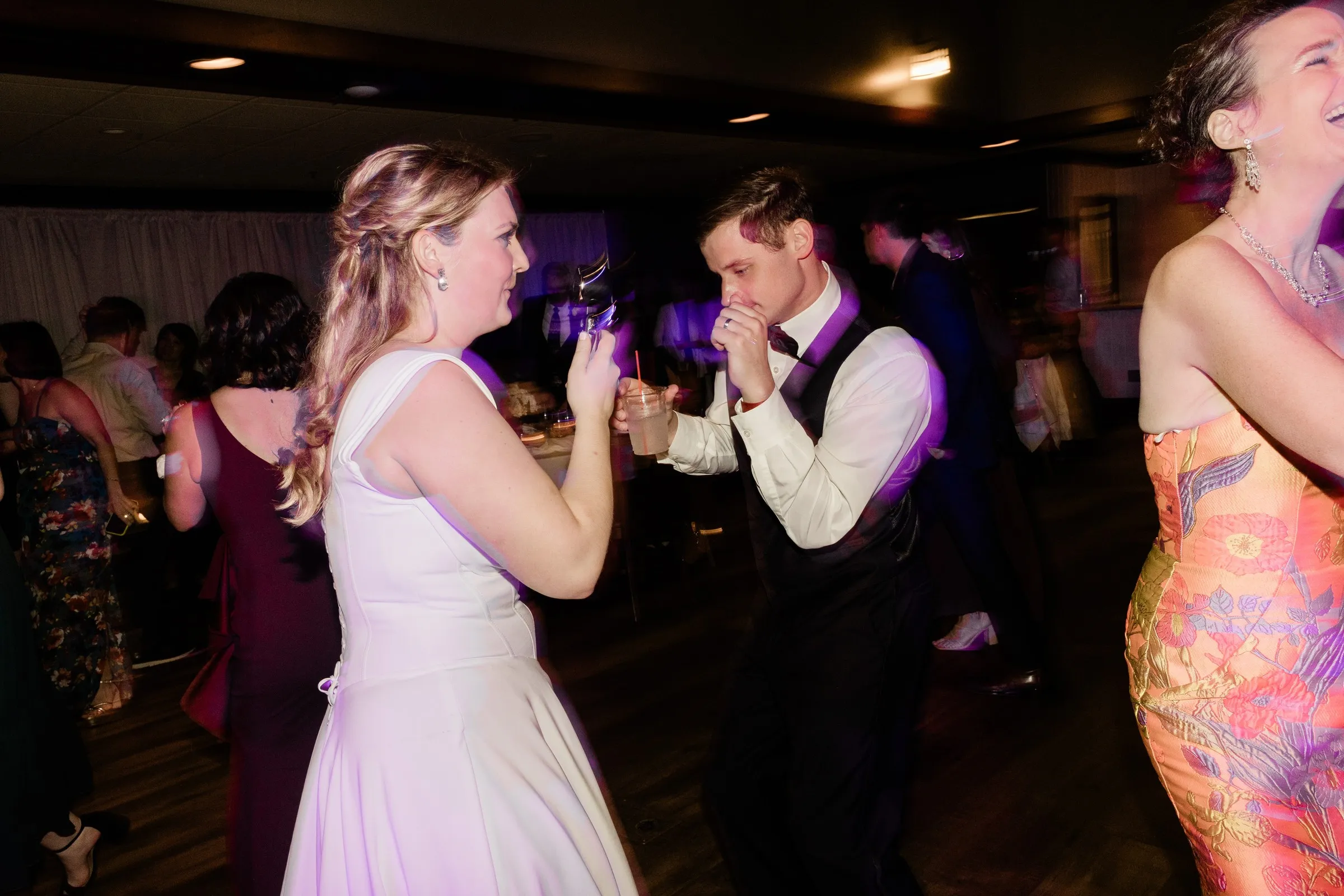 Lauren and Noah dance facing one another at their wedding reception — Tim Larsen Photography, Brainerd Lakes MN
