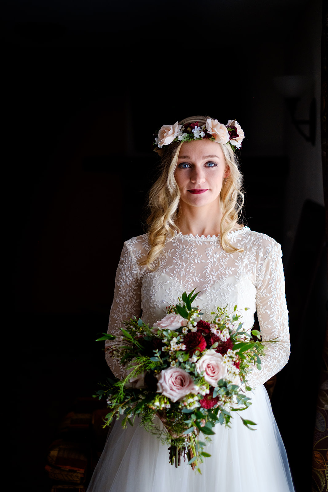 Bride portrait — flower crown, bouquet, window light, lace long sleeves — Tim Larsen Photography, Brainerd Lakes MN