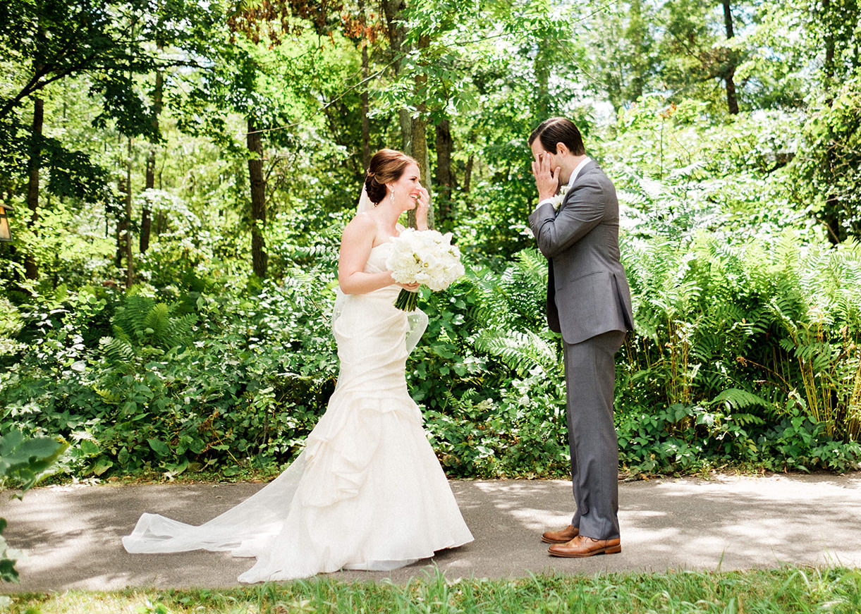First look — groom wiping tears in the garden at Grand View Lodge — Tim Larsen Photography, Brainerd Lakes MN