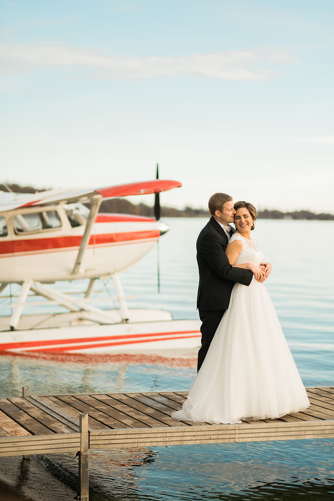 Couple on the dock with the seaplane — Gull Lake at Grand View Lodge — Tim Larsen Photography, Brainerd Lakes MN