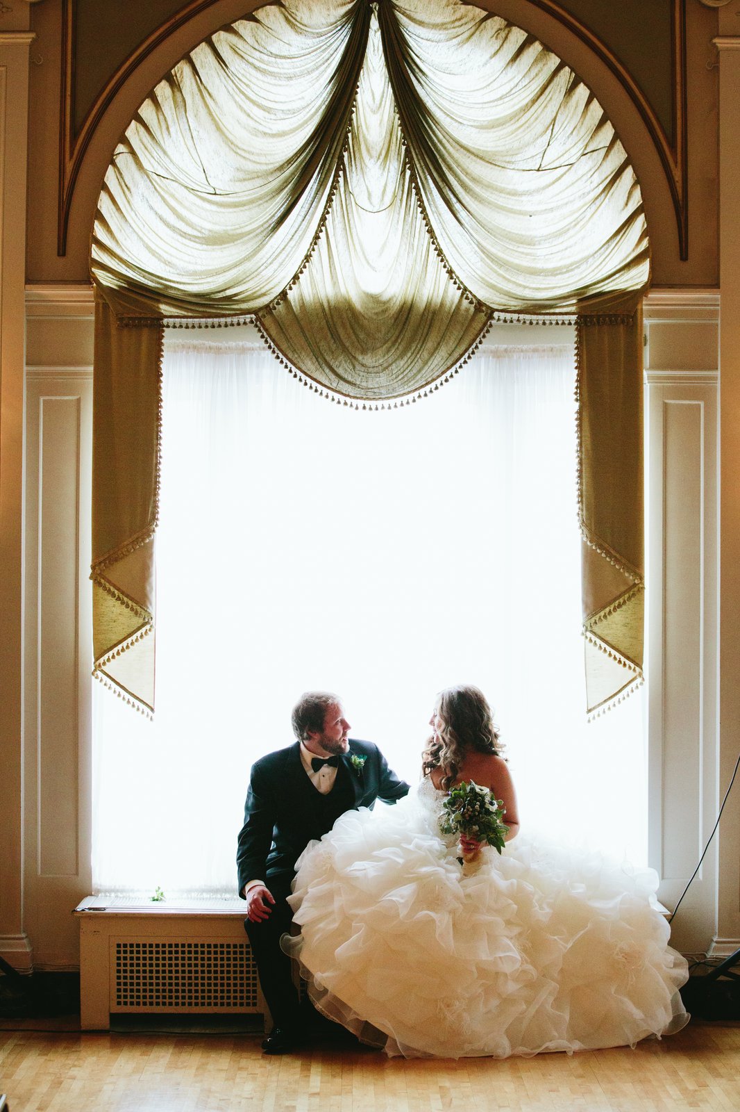 Winter couples portrait inside Greysolon Plaza — Duluth wedding — Tim Larsen Photography, Duluth MN