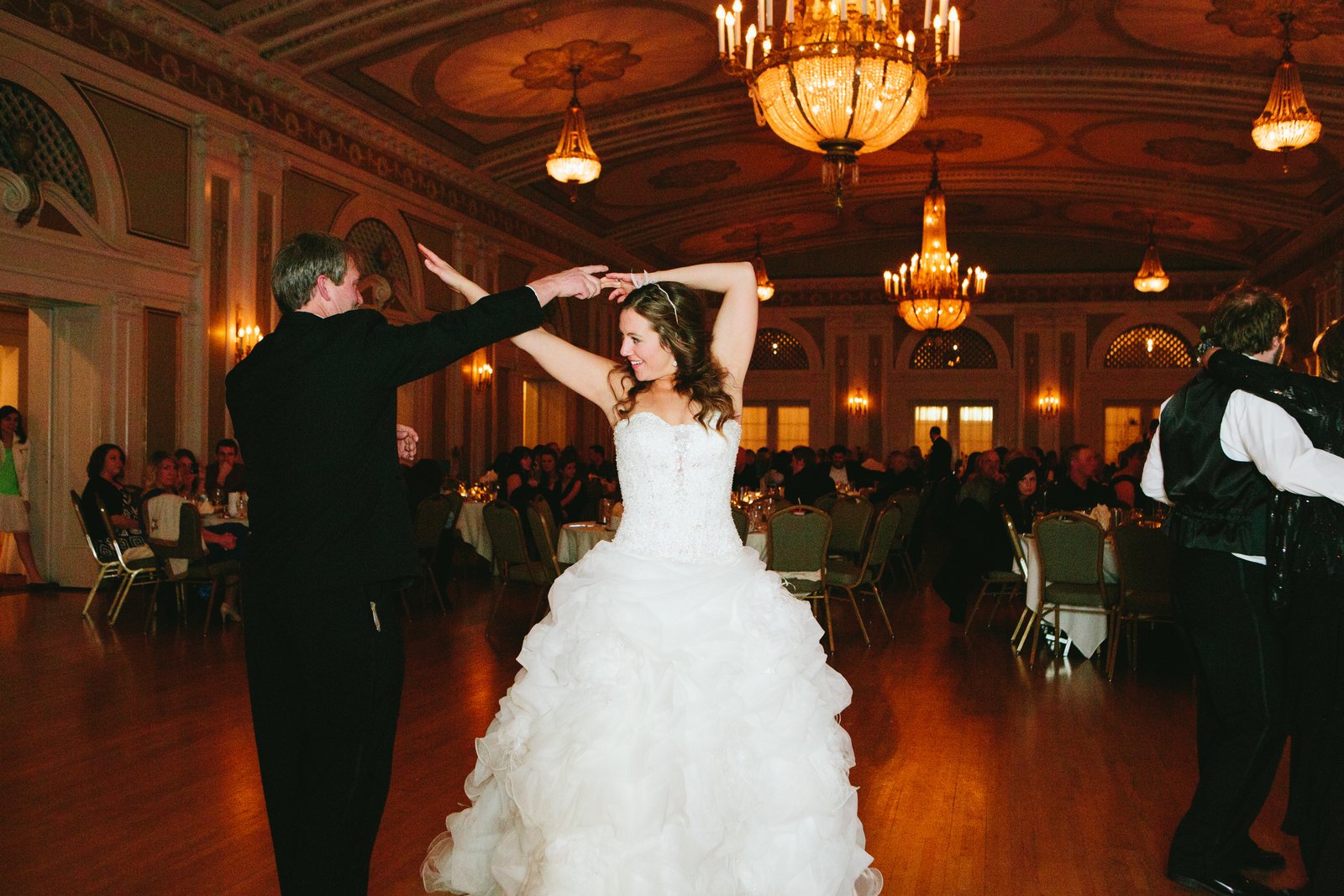Parent dance under the Greysolon Ballroom chandeliers — winter wedding — Tim Larsen Photography, Duluth MN
