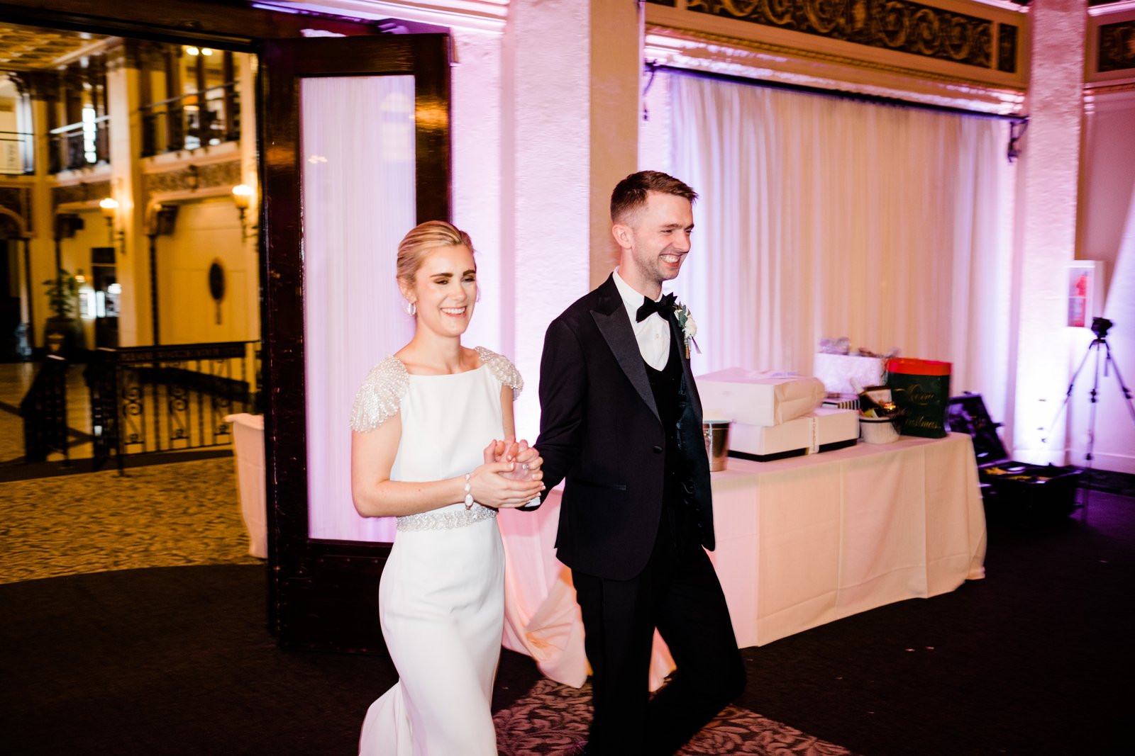 Grand entrance into the Greysolon Ballroom reception — spring wedding — Tim Larsen Photography, Duluth MN