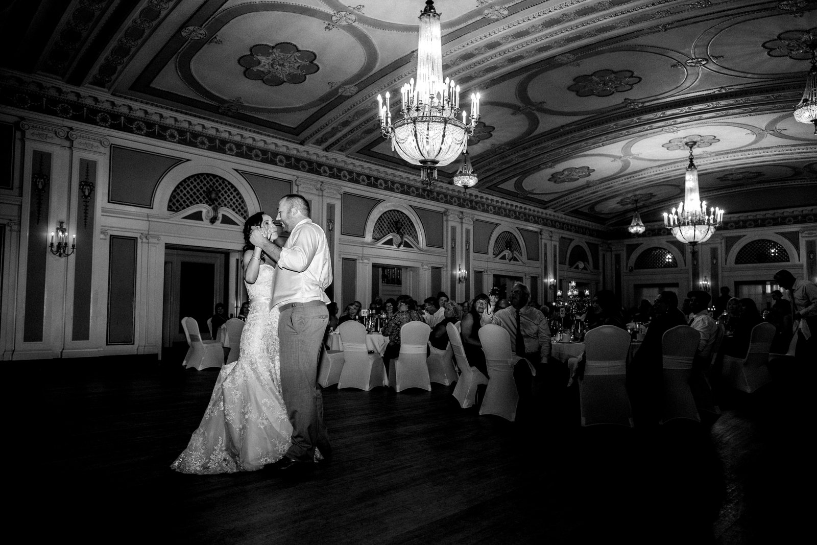 Intimate first dance — Greysolon Ballroom chandeliers, autumn evening — Tim Larsen Photography, Duluth MN