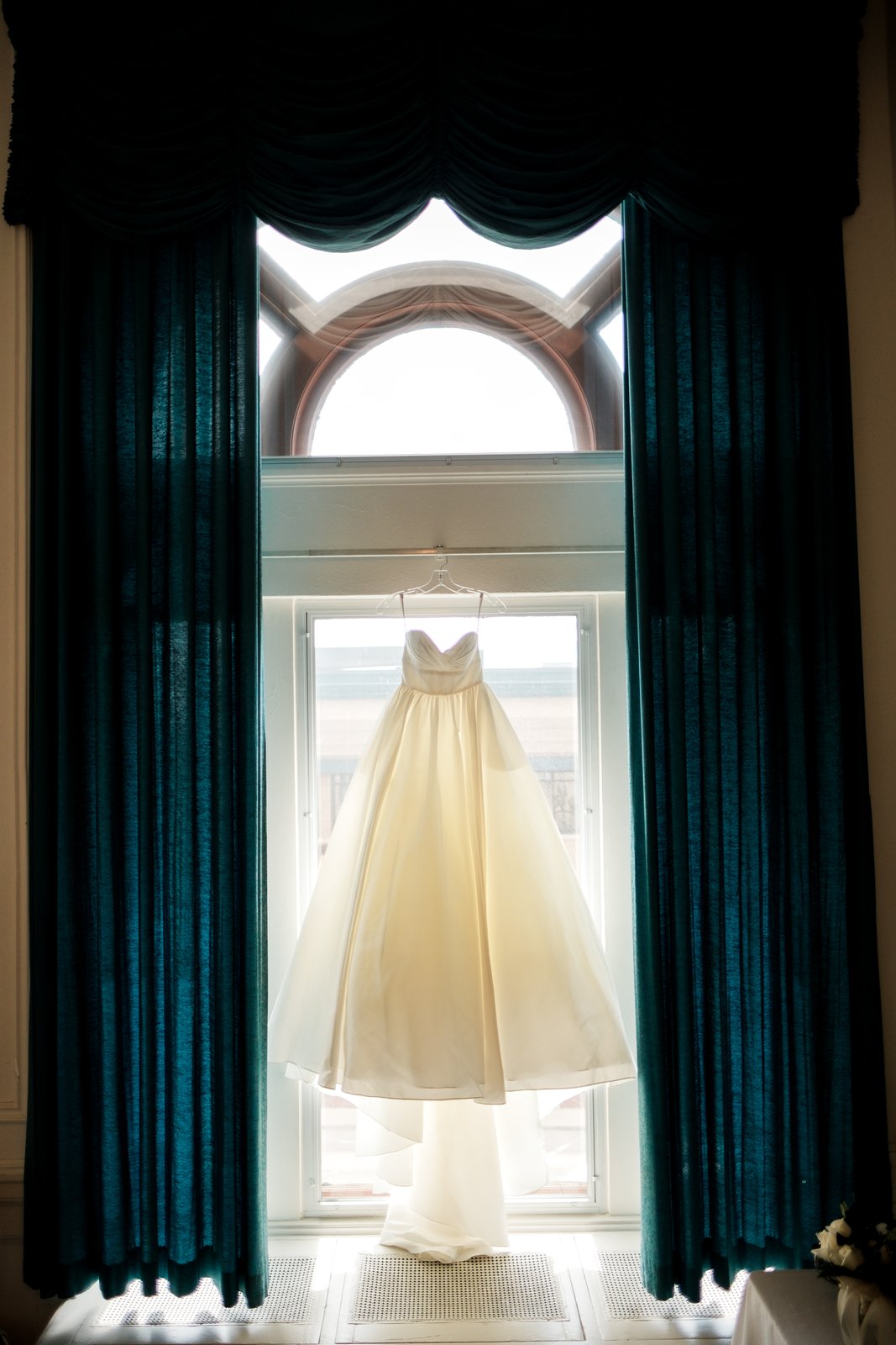 Wedding ring and bouquet detail — bridal suite window light, summer — Tim Larsen Photography, Duluth MN