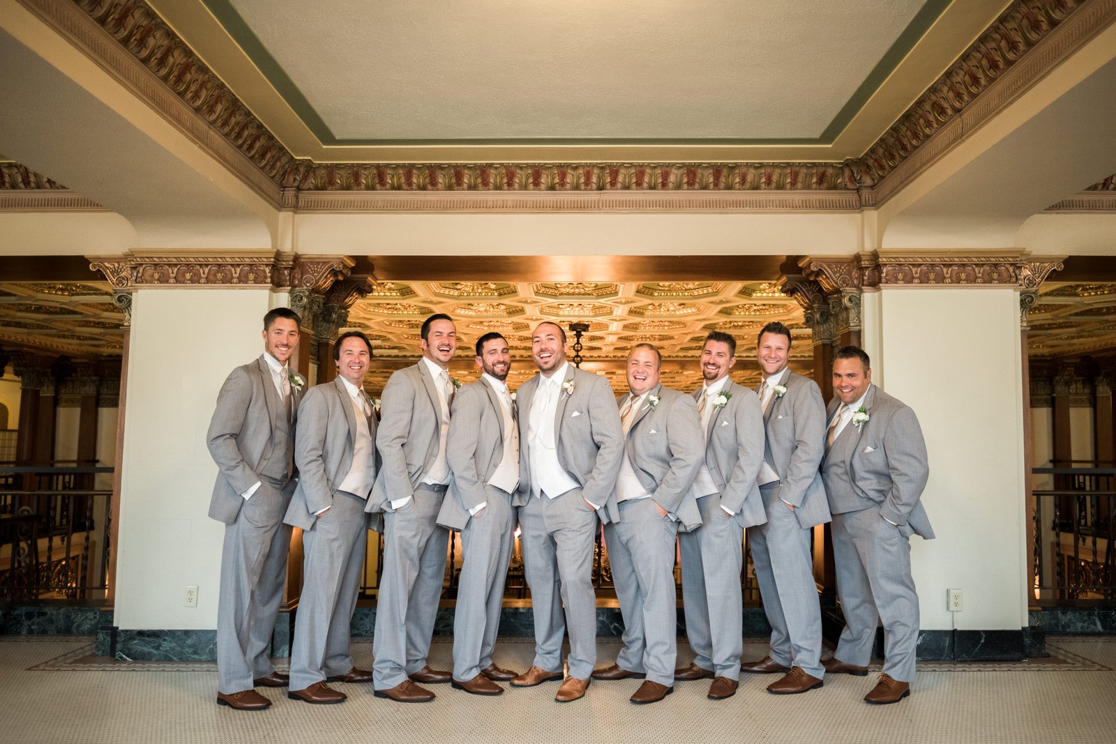 Bridal party at the Greysolon Ballroom entrance — autumn wedding — Tim Larsen Photography, Duluth MN