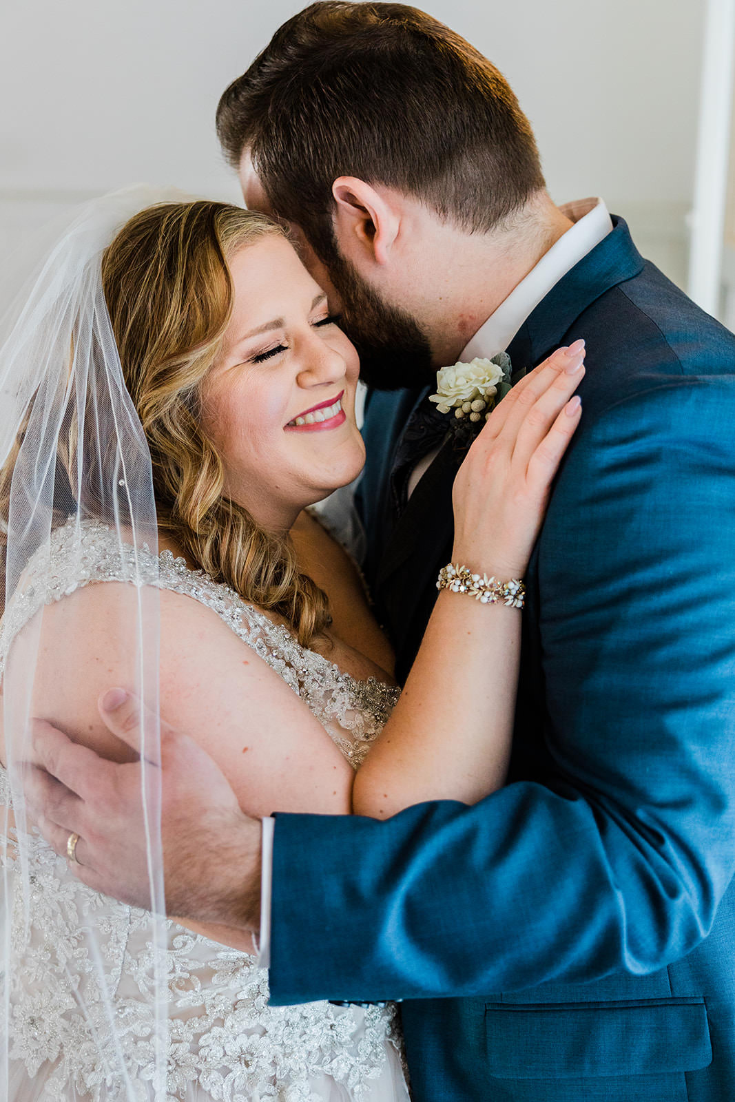 Matthew kissing Lauren on the forehead — editorial portrait at Grand View Lodge — Tim Larsen Photography, Brainerd Lakes MN