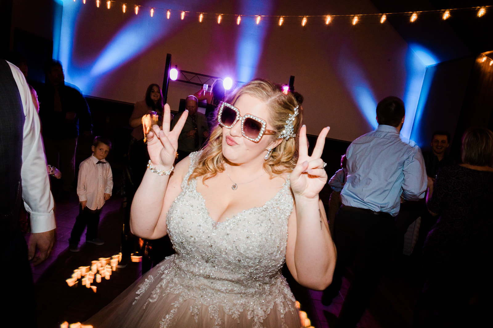 Lauren on the dance floor in heart sunglasses — Grand View Lodge reception — Tim Larsen Photography, Brainerd Lakes MN