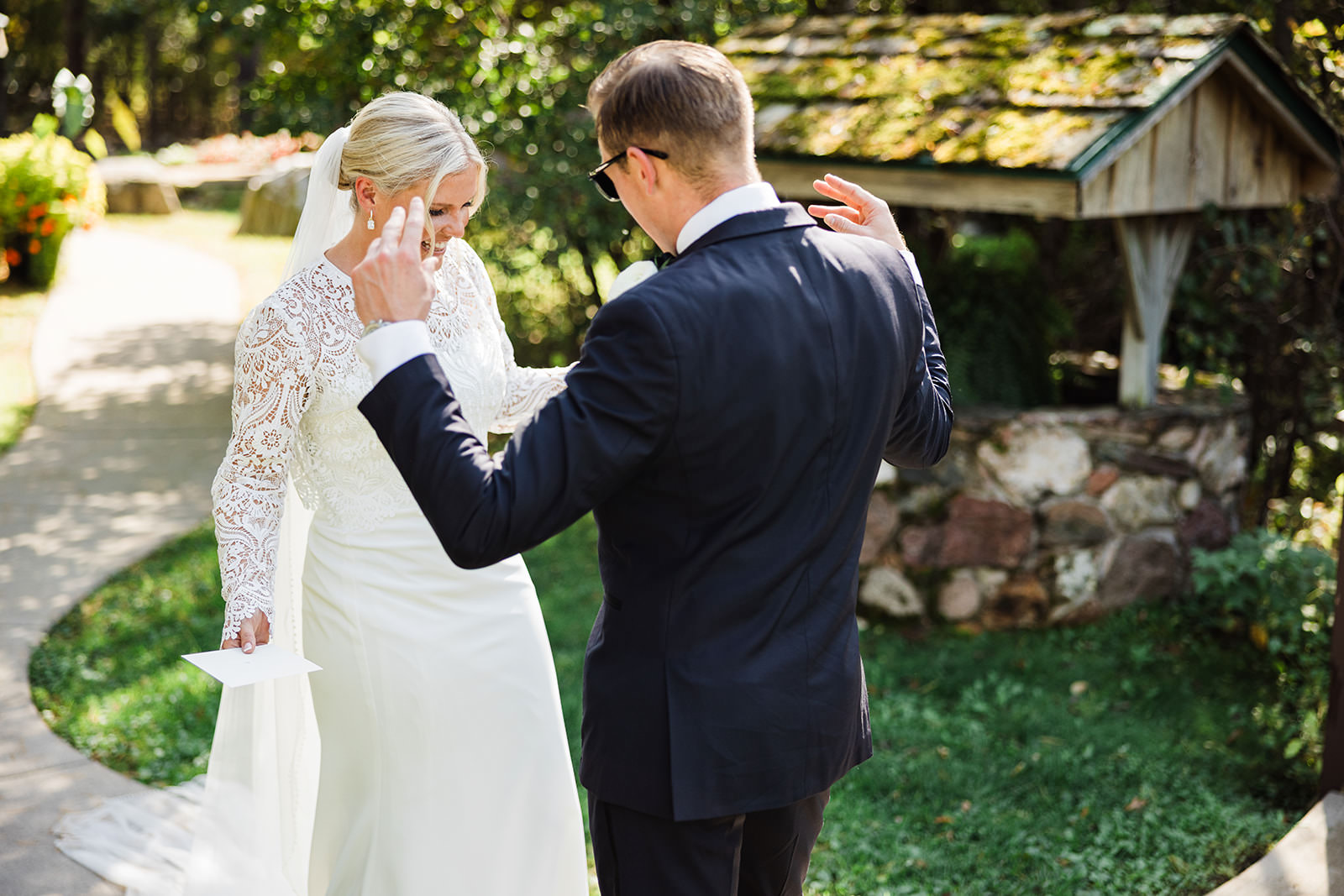 First look — Maddy and Tyler in the Grand View Lodge gardens — Tim Larsen Photography, Brainerd Lakes MN