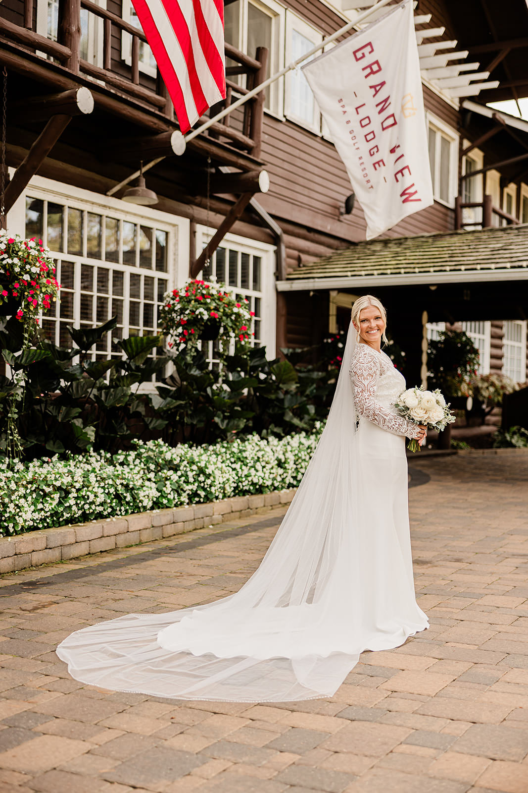 Maddy in front of the Grand View Lodge main entrance — Tim Larsen Photography, Brainerd Lakes MN