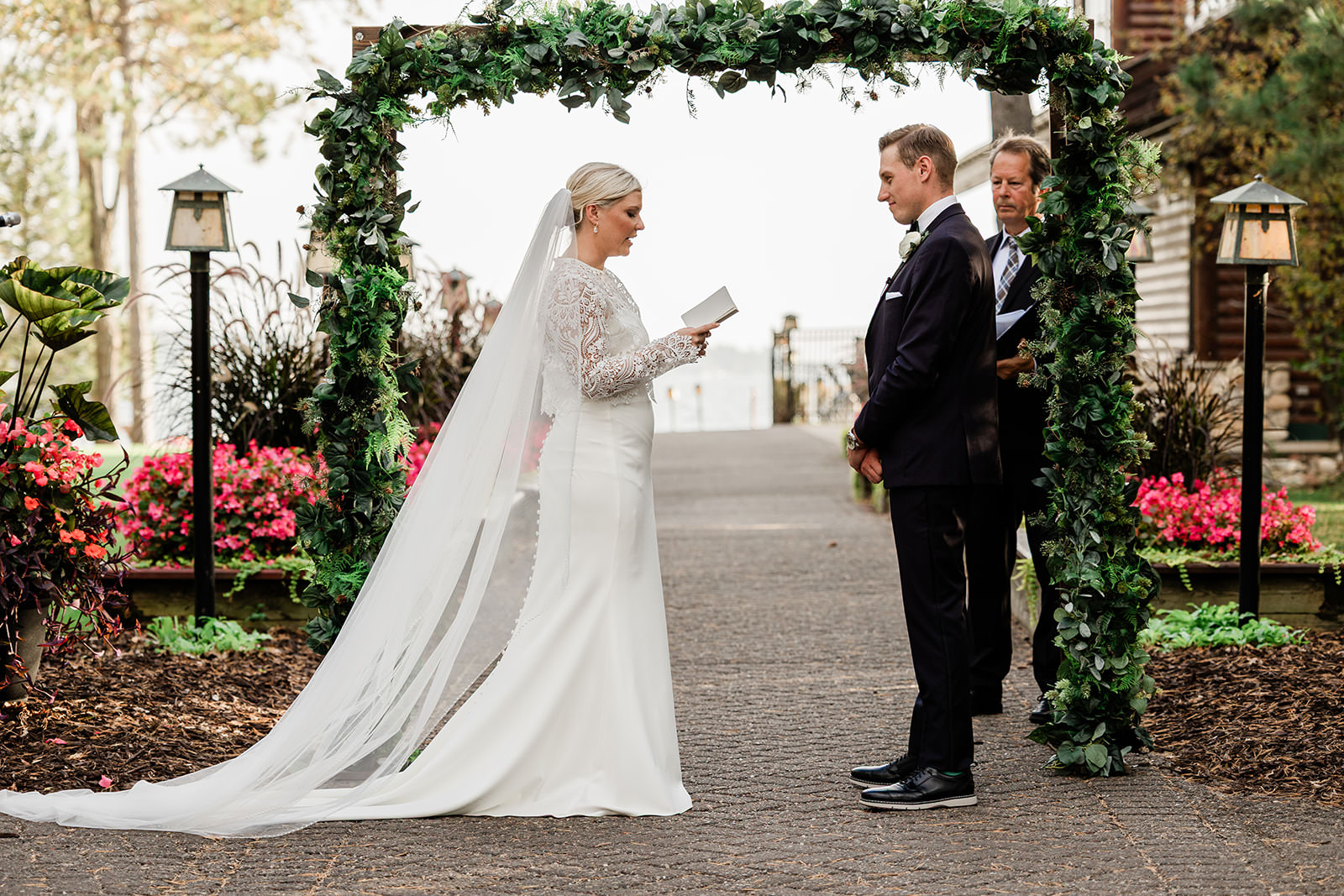 The kiss — Grand Staircase ceremony at Grand View Lodge — Tim Larsen Photography, Brainerd Lakes MN