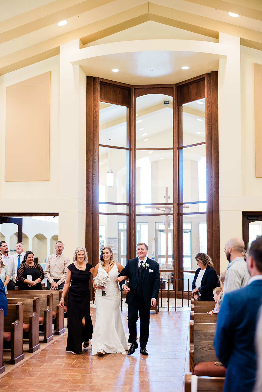 Bride walking down the aisle with her father at Immaculate Heart Catholic Church — Tim Larsen Photography