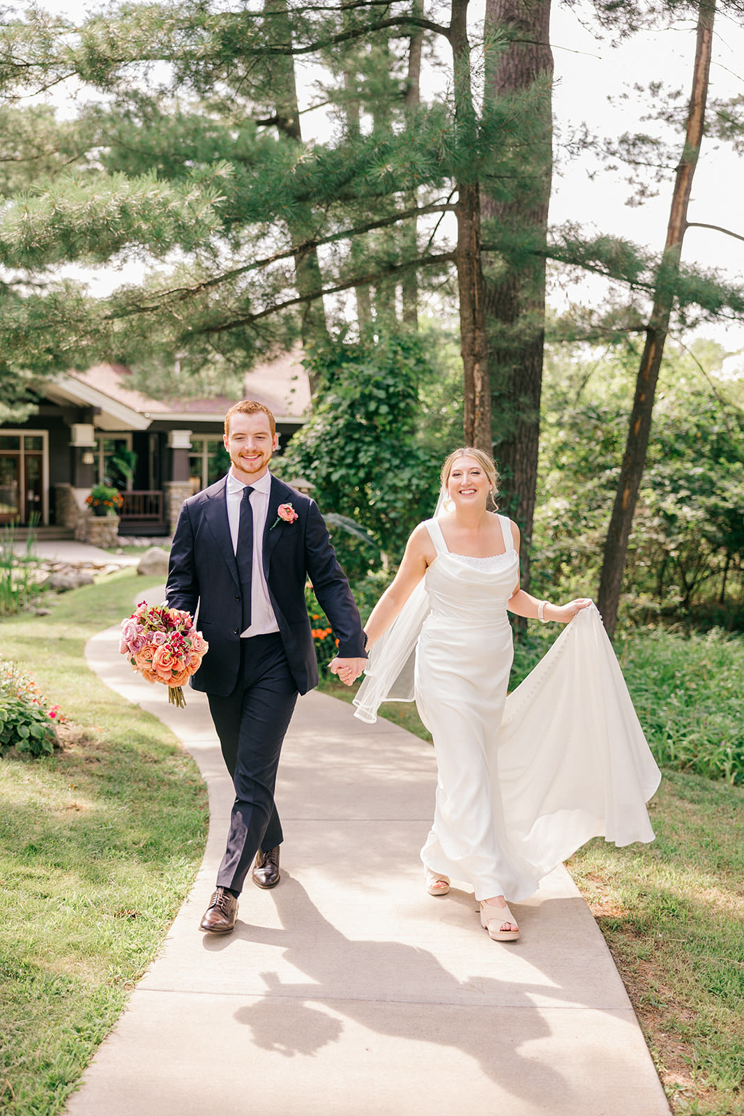 Bride and groom walking hand in hand under the pines — Grand View Lodge on Gull Lake — Tim Larsen Photography, Brainerd Lakes MN