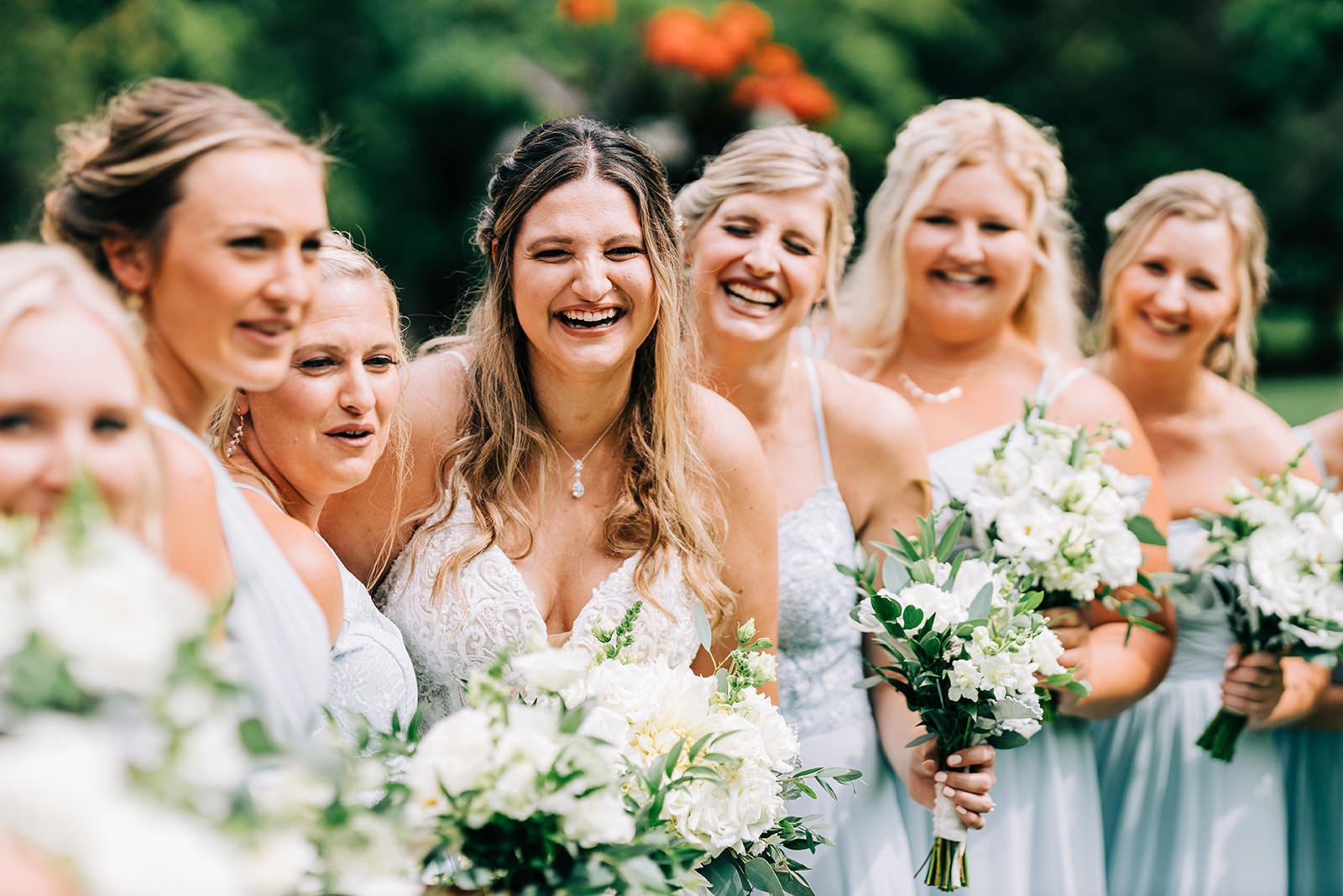 Shannon laughing with her bridesmaids — candid bridal party moment — Tim Larsen Photography, Brainerd Lakes MN