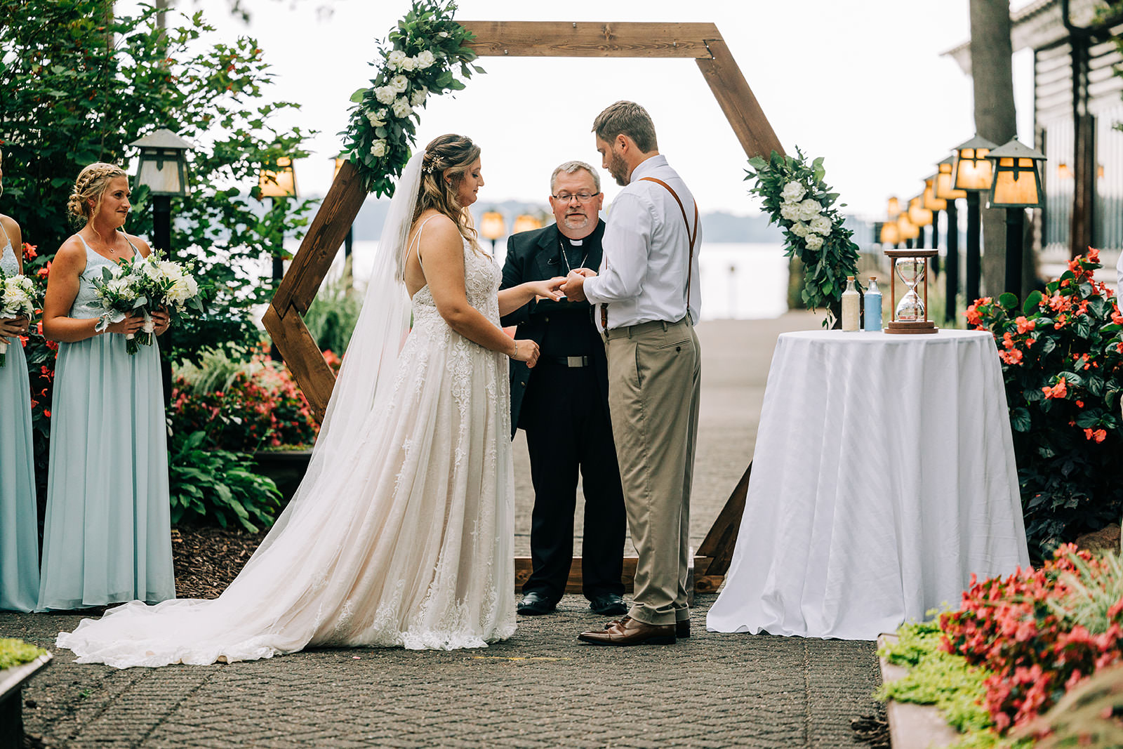 Vows at the hexagonal arch — Grand View Lodge ceremony on Gull Lake — Tim Larsen Photography, Brainerd Lakes MN