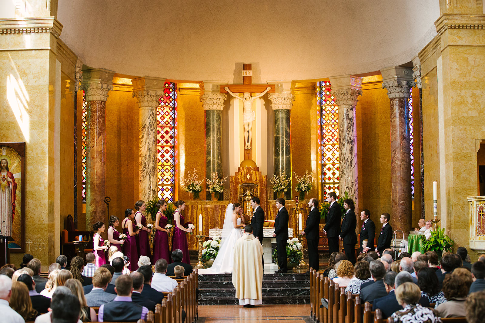 Cathedral ceremony with golden altar and stained glass — Duluth wedding — Tim Larsen Photography, Brainerd Lakes MN
