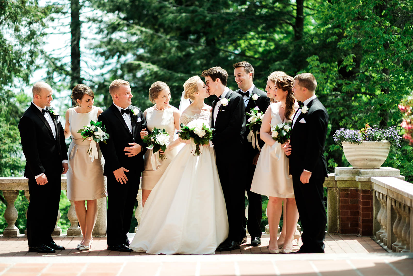 Wedding party on a stone terrace with gardens — Duluth estate wedding — Tim Larsen Photography, Brainerd Lakes MN